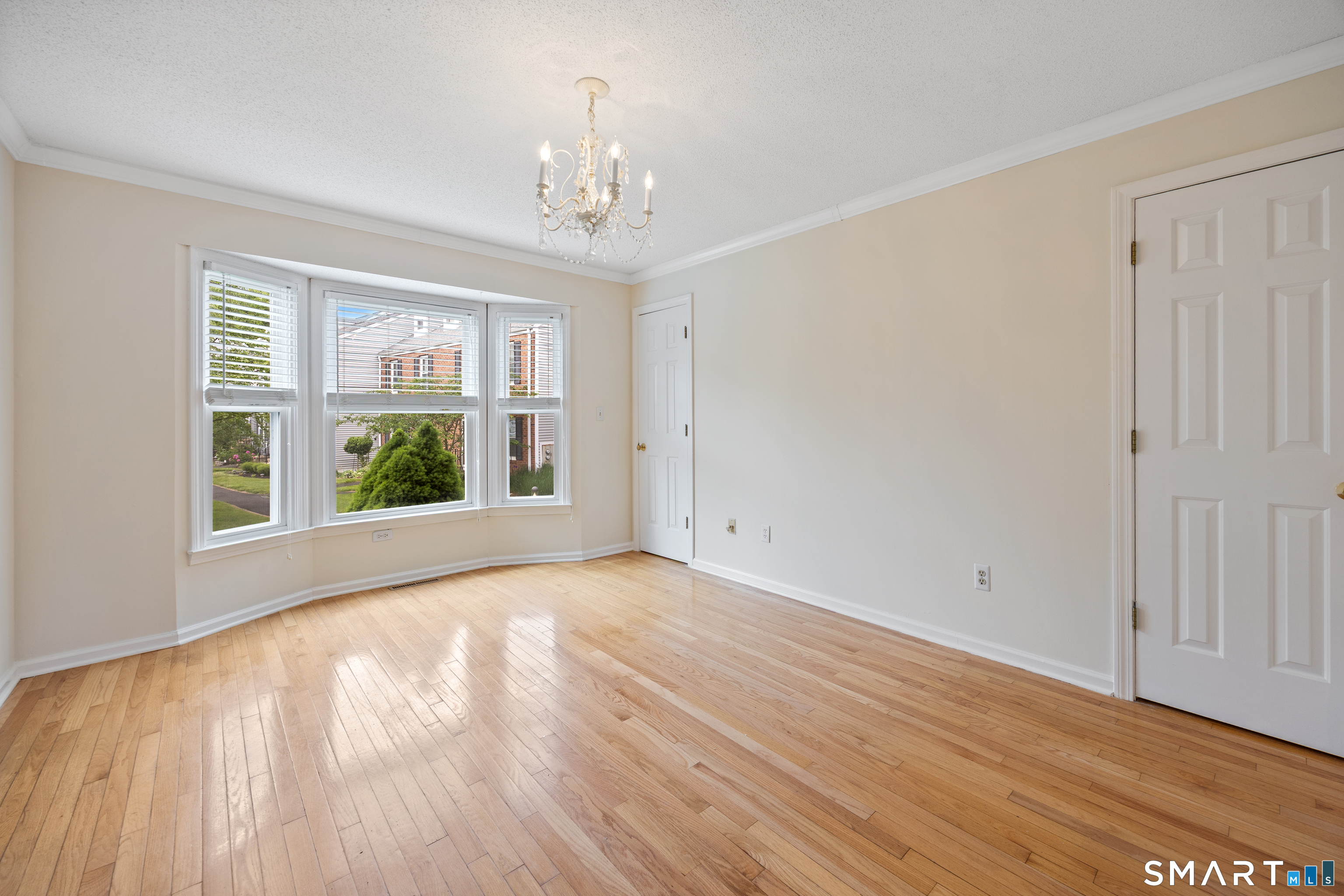 111 Strathmore Lane, Unit 111 Wallingford, CT 06492 - Photo 13 of 32 Large bay window provides much natural light