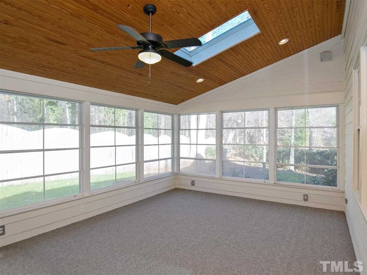 7909 Ridge Pointe Lane Raleigh, NC 27615 - Photo 21 of 25 HUGE sunroom with new carpeting and skylights