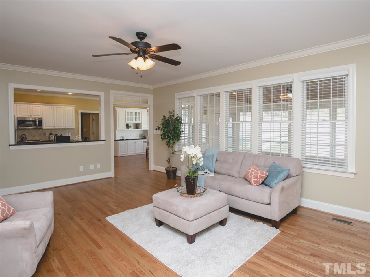 7909 Ridge Pointe Lane Raleigh, NC 27615 - Photo 7 of 25 Open layout; wall of windows brings in natural light