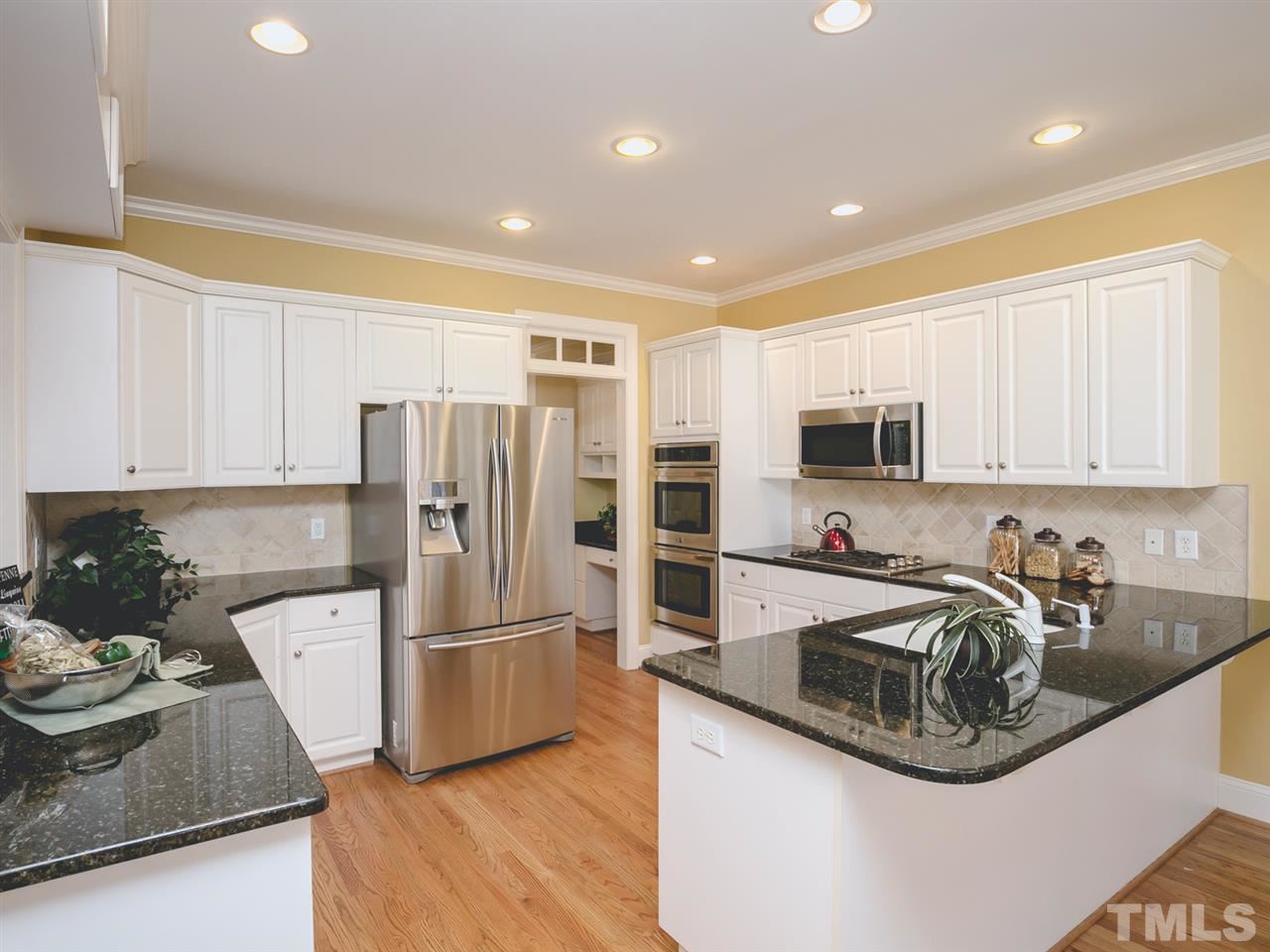 7909 Ridge Pointe Lane Raleigh, NC 27615 - Photo 9 of 25 Plenty of counter space here plus eat in bar!