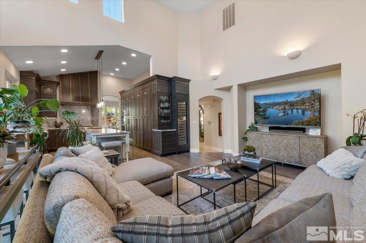 14235 Powder River Court Reno, NV 89511 - Photo 15 of 40 a living room with furniture and a view of kitchen