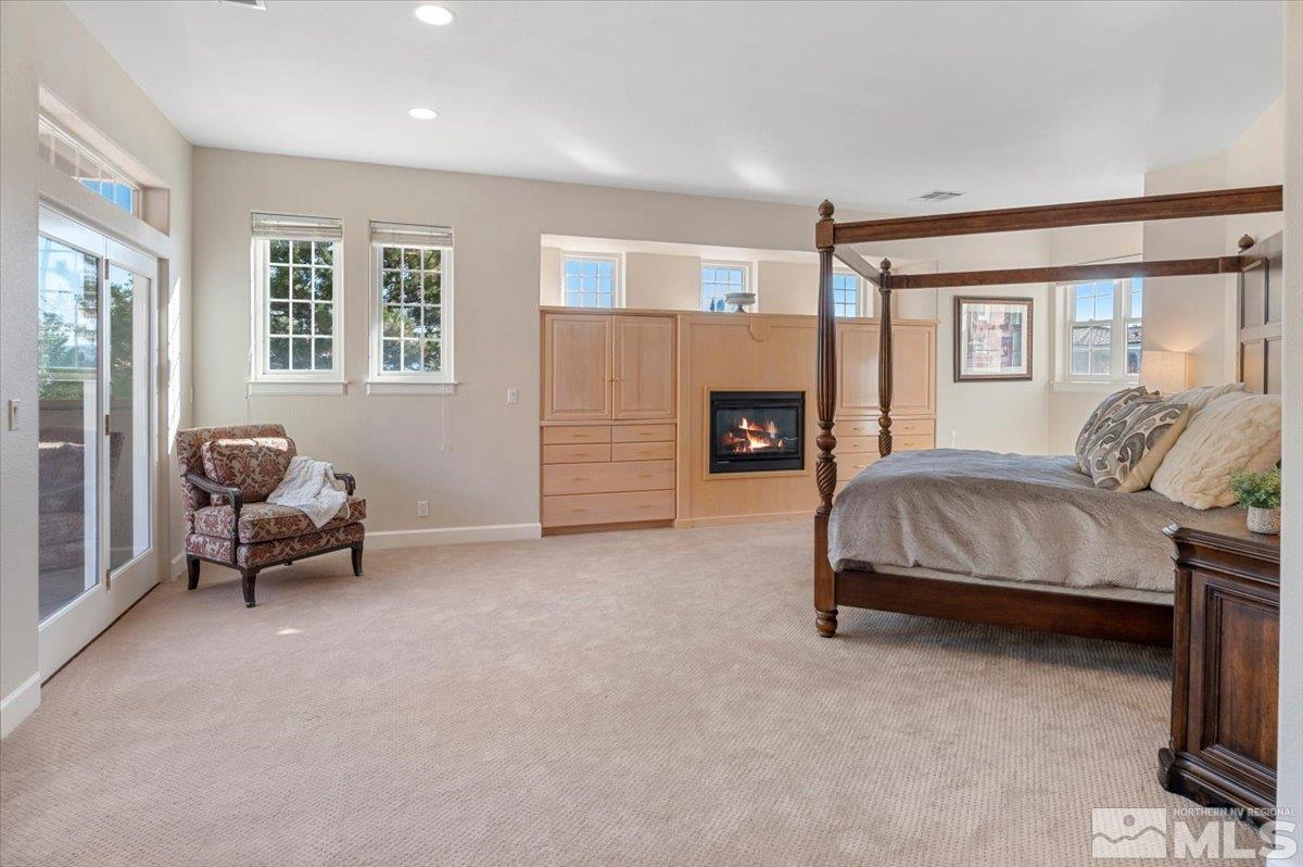 14235 Powder River Court Reno, NV 89511 - Photo 18 of 40 a bedroom with a bed and a couch