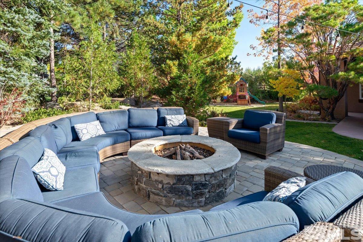 14235 Powder River Court Reno, NV 89511 - Photo 30 of 40 a view of outdoor sitting area with furniture and garden