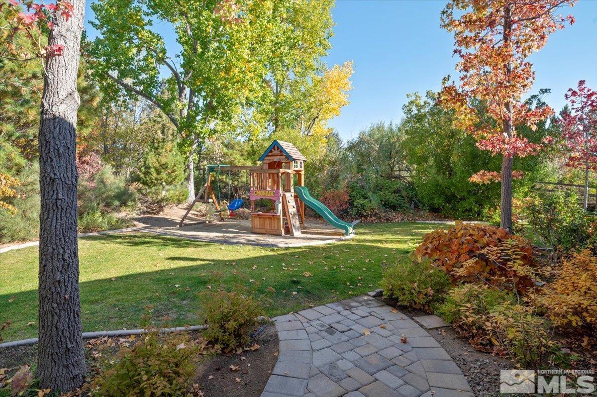 14235 Powder River Court Reno, NV 89511 - Photo 33 of 40 a view of a garden with a tree