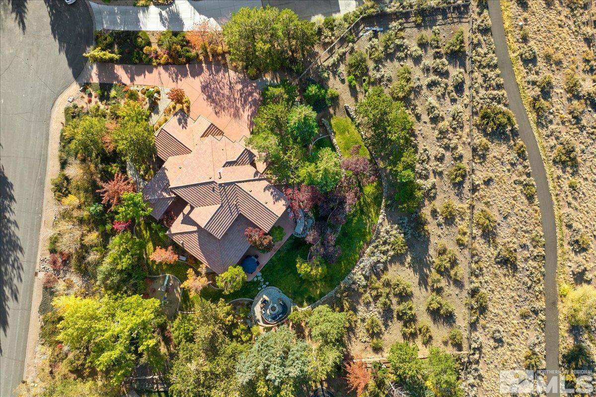 14235 Powder River Court Reno, NV 89511 - Photo 36 of 40 a aerial view of a house with a yard and garden