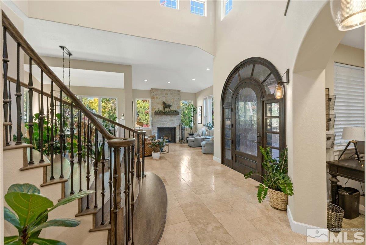 14235 Powder River Court Reno, NV 89511 - Photo 7 of 40 a view of entryway and hall with dining room