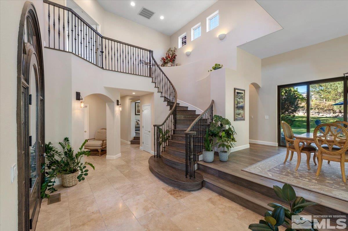 14235 Powder River Court Reno, NV 89511 - Photo 9 of 40 a living room with furniture and a potted plant