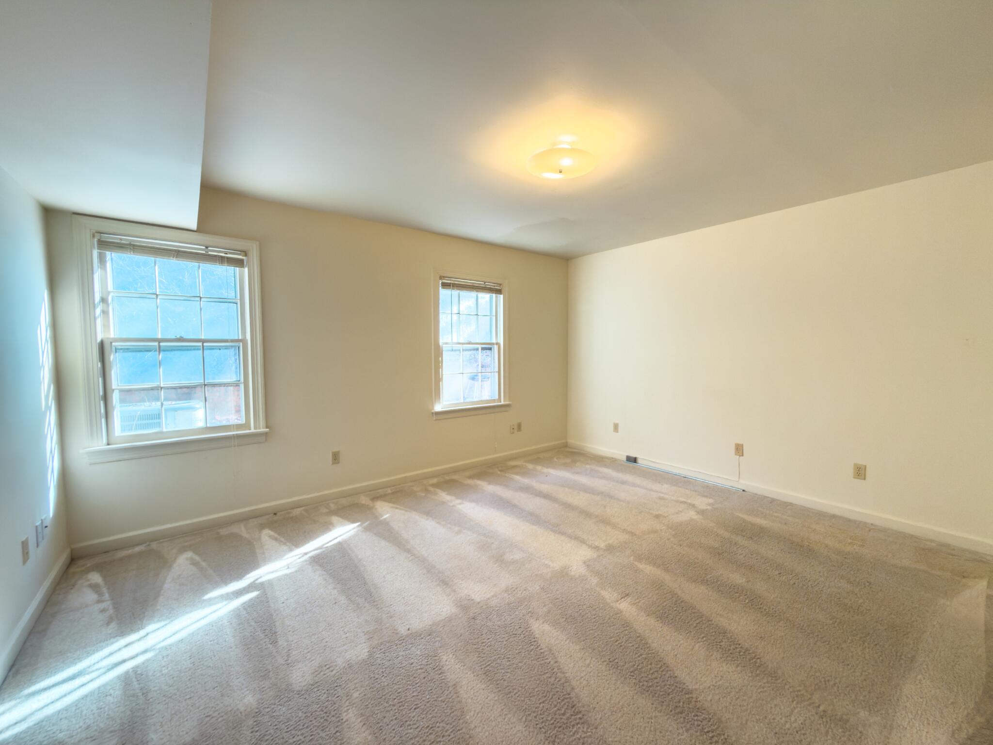847 King James Street Southwest, Unit A Roanoke, VA 24014 - Photo 7 of 9 a view of an empty room with a window