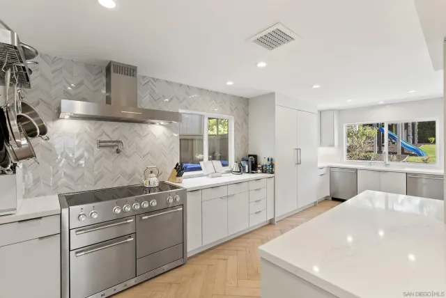 a bathroom with a shower and a glass door