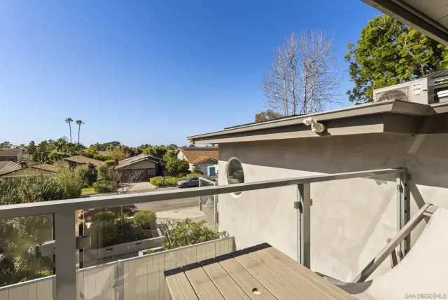 a view of a house with basketball court