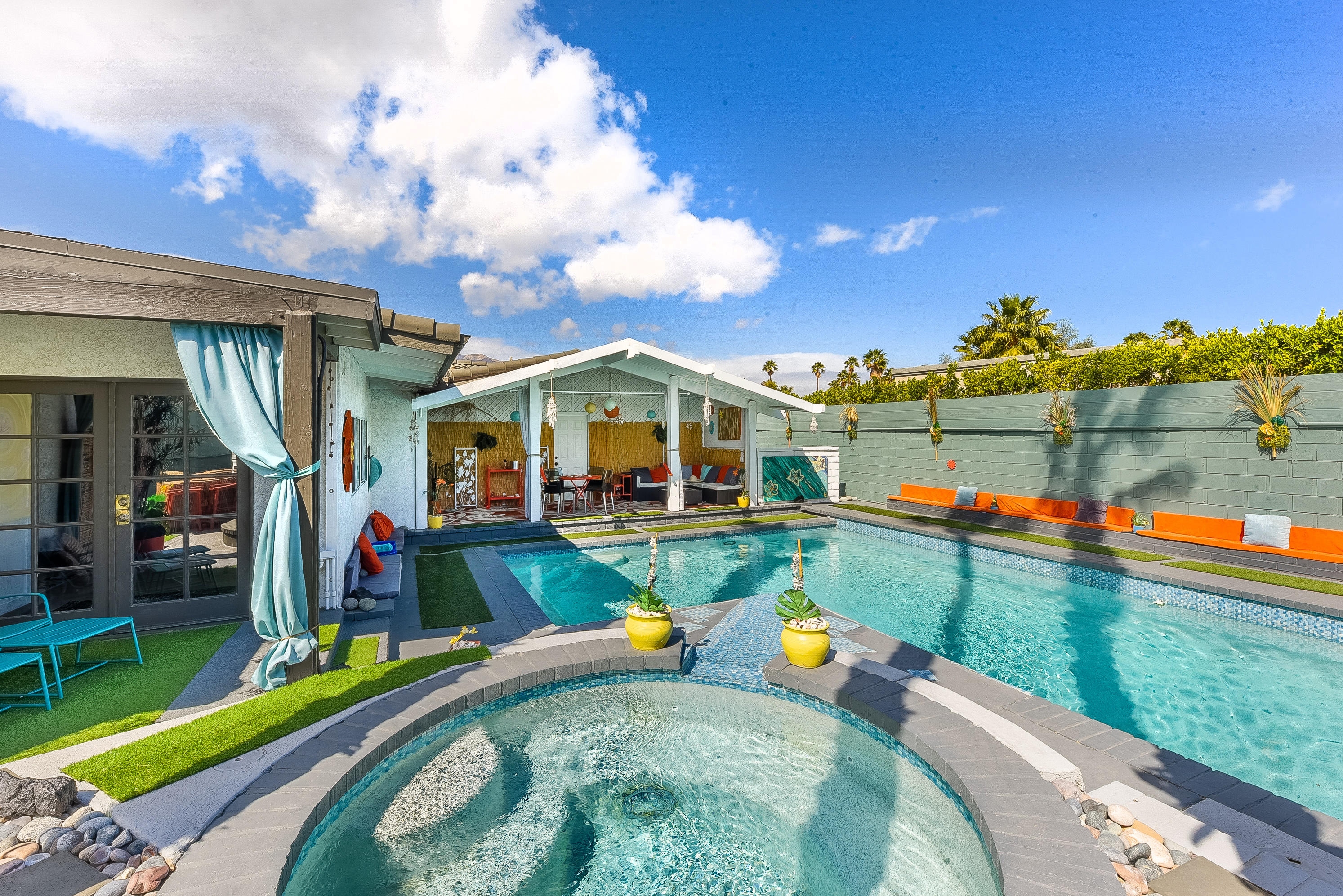 2306 Acacia Road East Palm Springs, CA 92262 - Photo 2 of 37 a view of a swimming pool with a patio