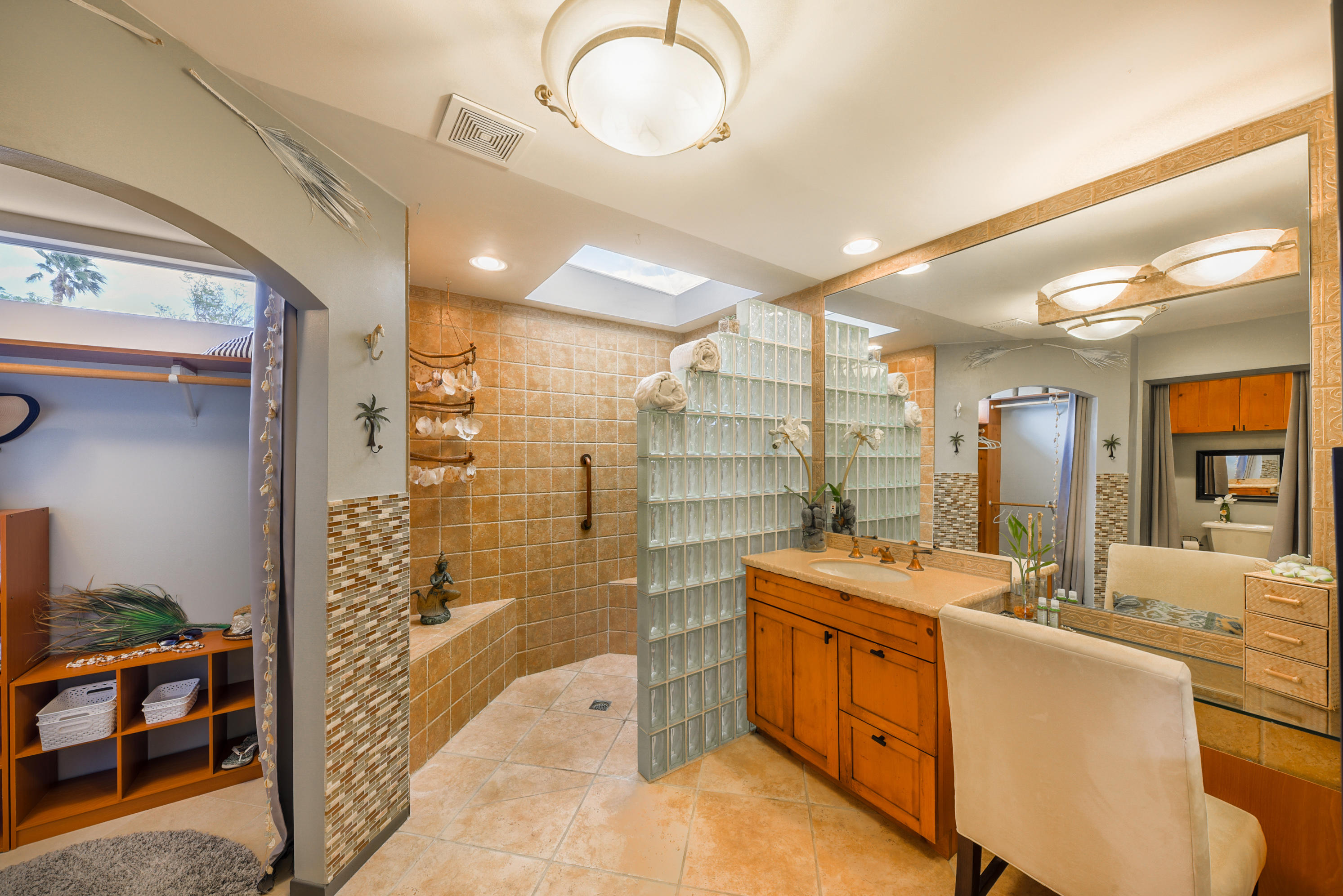 2306 Acacia Road East Palm Springs, CA 92262 - Photo 16 of 37 a bathroom with a double vanity sink mirror and shower