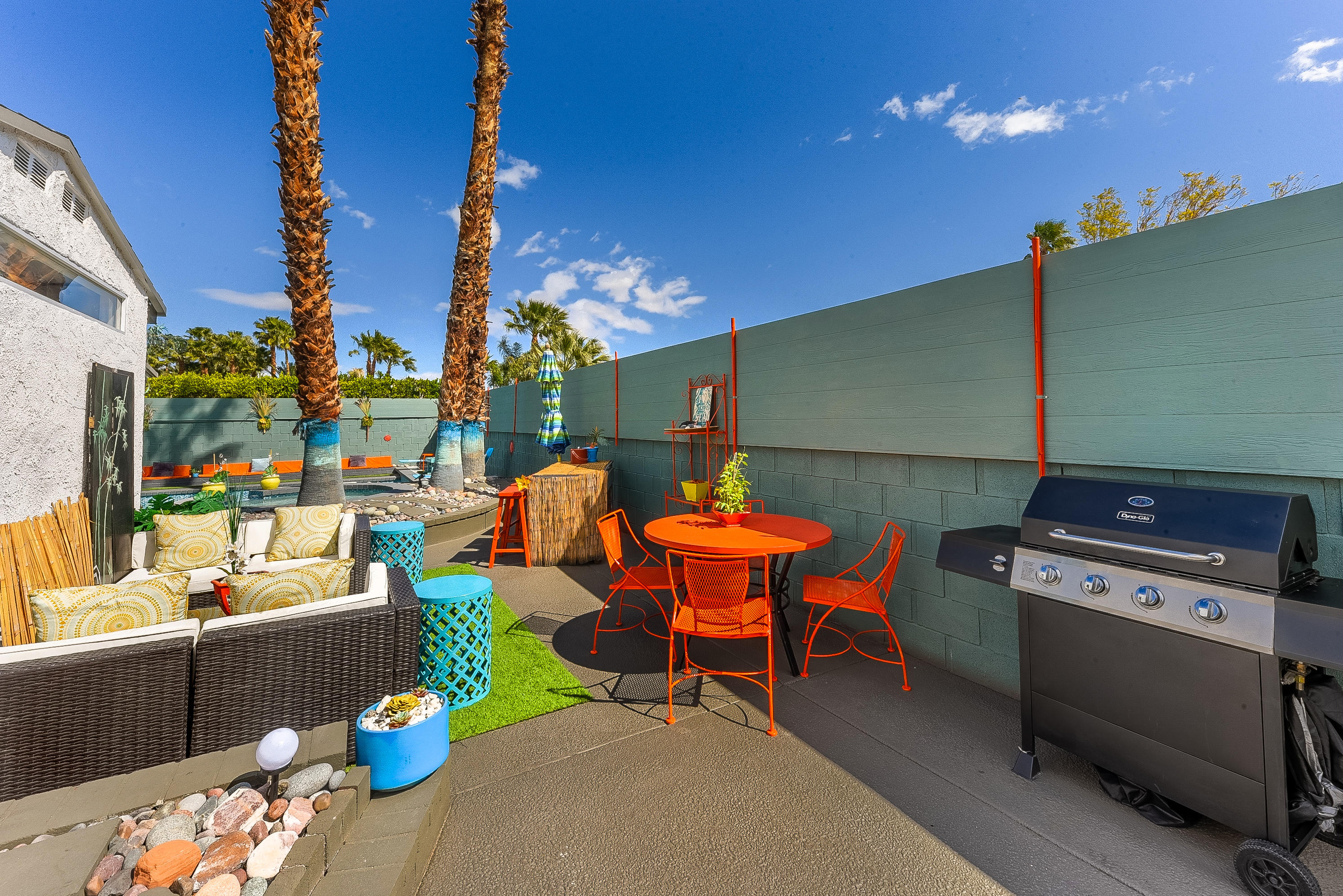 2306 Acacia Road East Palm Springs, CA 92262 - Photo 31 of 37 a outdoor living space with furniture and a fireplace