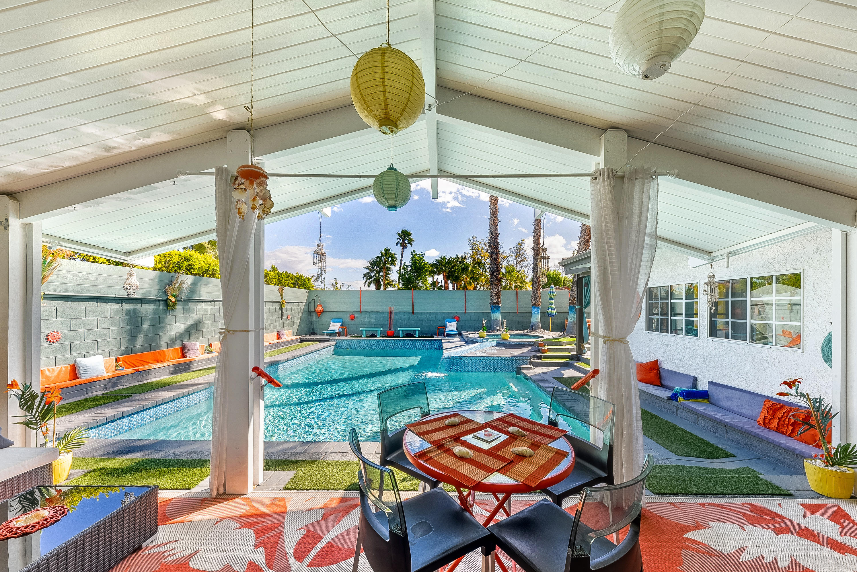 2306 Acacia Road East Palm Springs, CA 92262 - Photo 5 of 37 a outdoor space with patio lots of furniture and chandelier