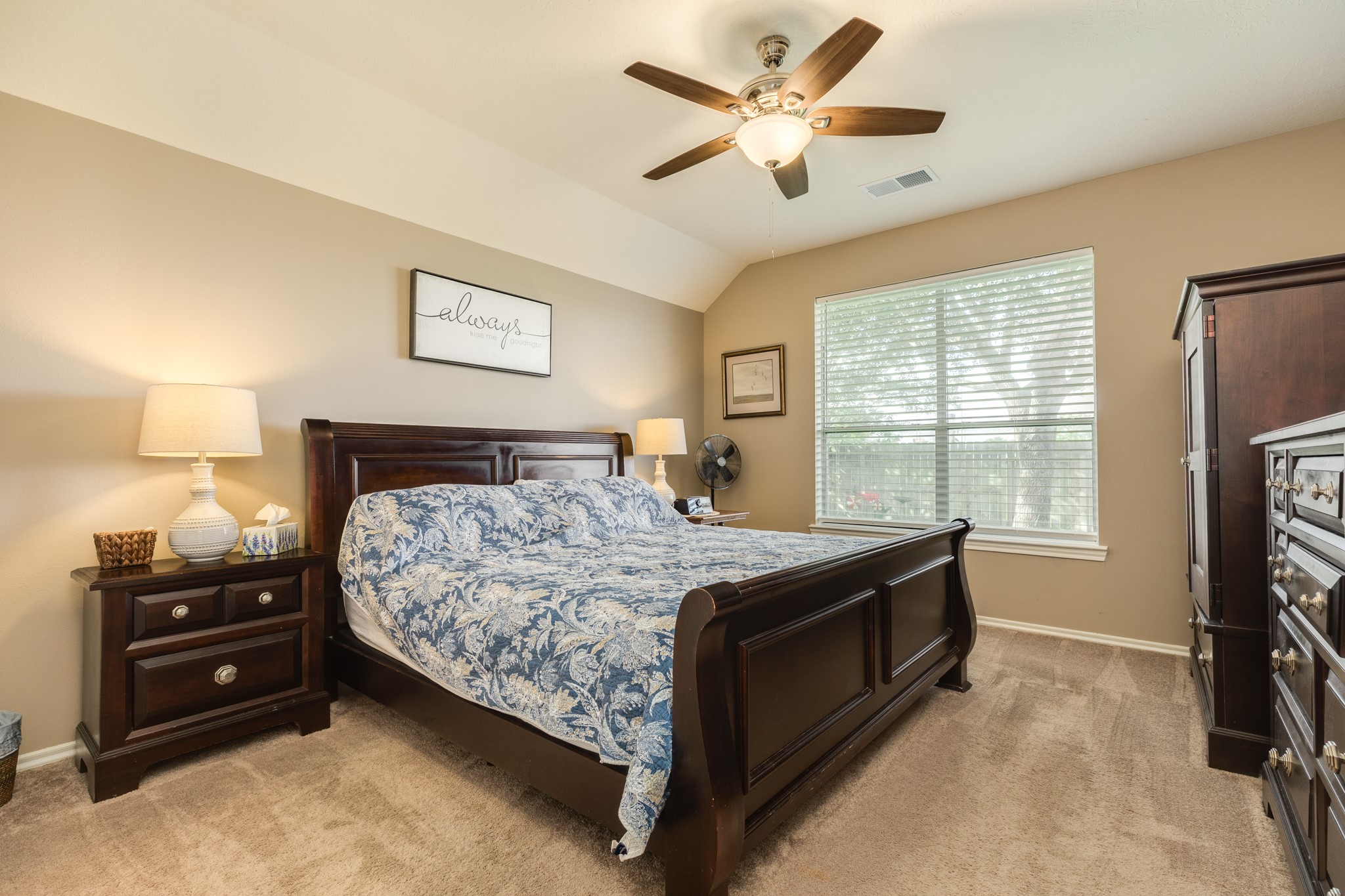 13808 Stark Bridge Lane Rosharon, TX 77583 - Photo 16 of 39 Primary bedroom featuring oversized windows with expansive views of the large backyard.