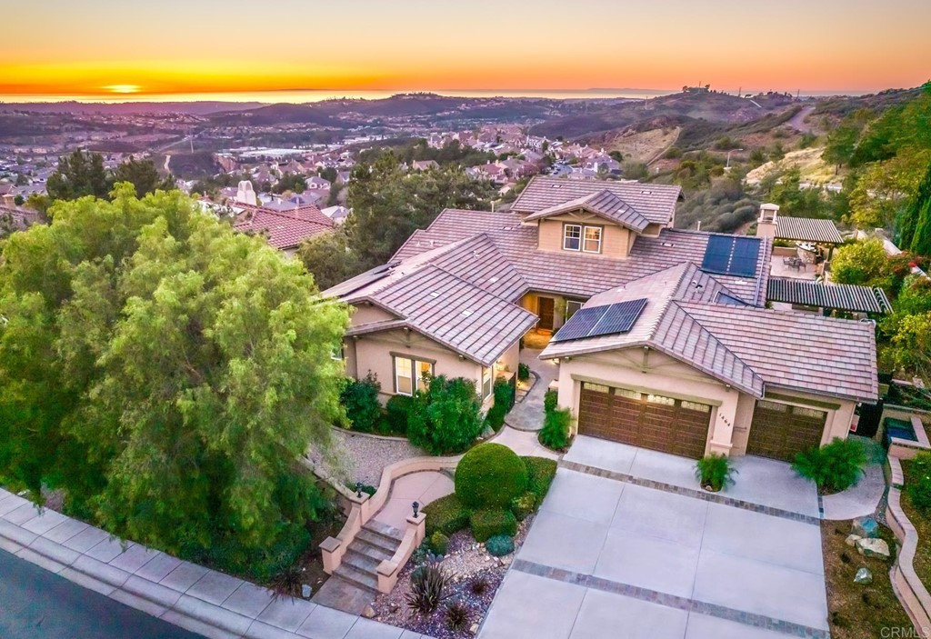 an aerial view of a house with a garden