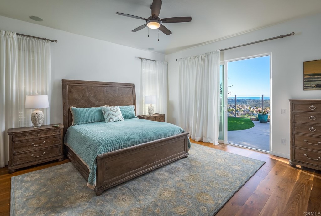 1464 Schoolhouse Way San Marcos, CA 92078 - Photo 21 of 48 a bedroom with a bed and a dresser