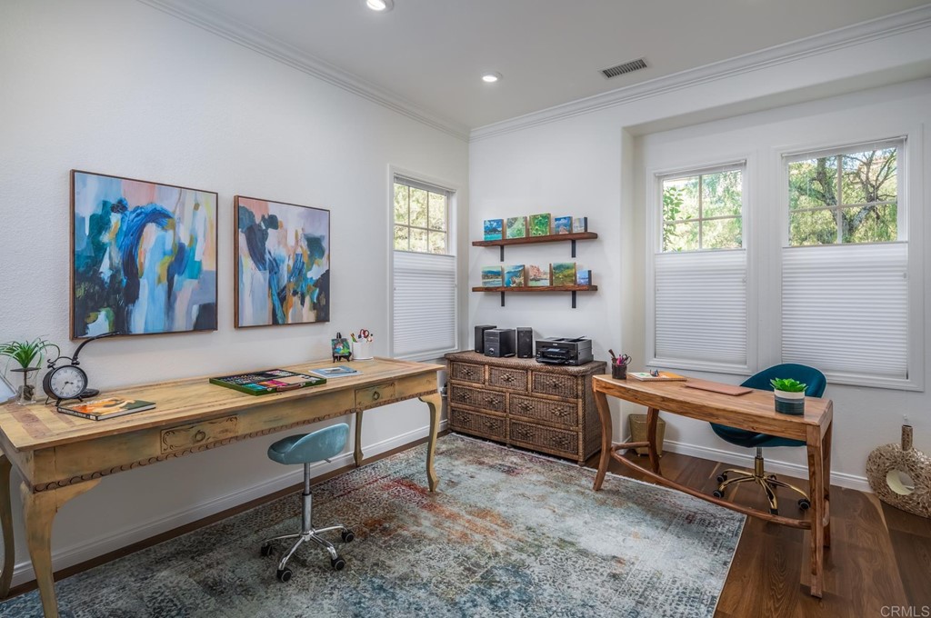 1464 Schoolhouse Way San Marcos, CA 92078 - Photo 26 of 48 a room with furniture a rug and a window