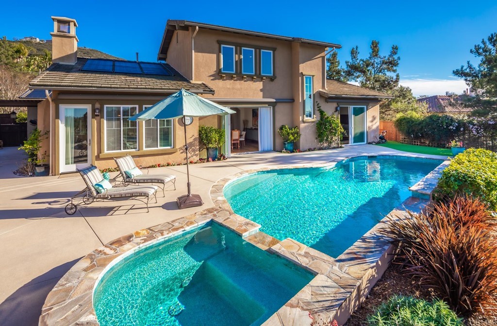 1464 Schoolhouse Way San Marcos, CA 92078 - Photo 32 of 48 a view of a house with swimming pool and sitting area