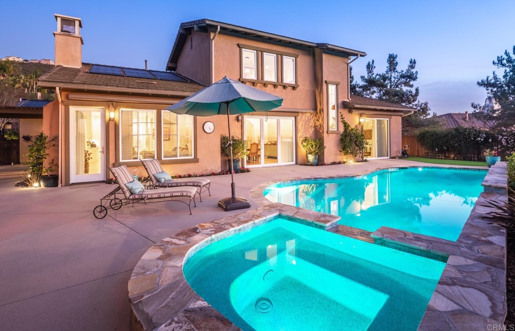 1464 Schoolhouse Way San Marcos, CA 92078 - Photo 10 of 48 a view of a house with swimming pool and sitting area