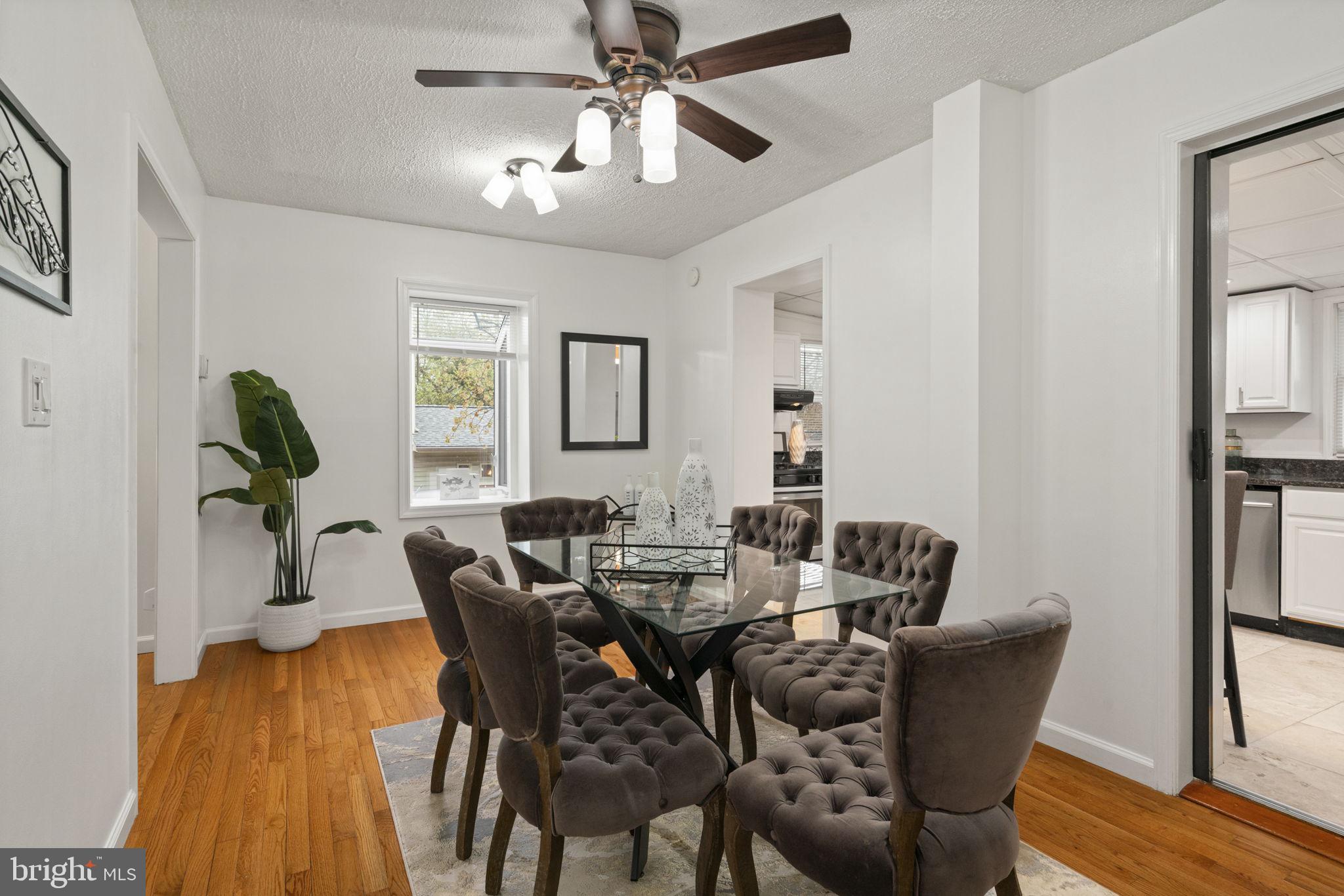 2732 Fort Drive Alexandria, VA 22303 - Photo 12 of 47 a view of a dining room with furniture and wooden floor