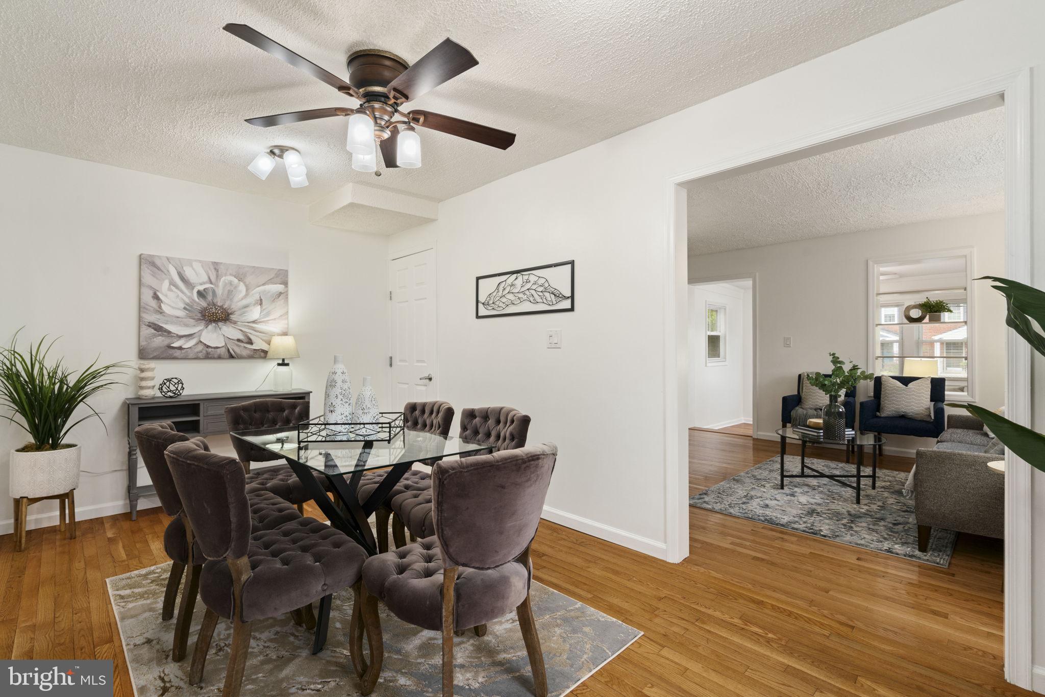 2732 Fort Drive Alexandria, VA 22303 - Photo 13 of 47 a view of a dining room with furniture and wooden floor