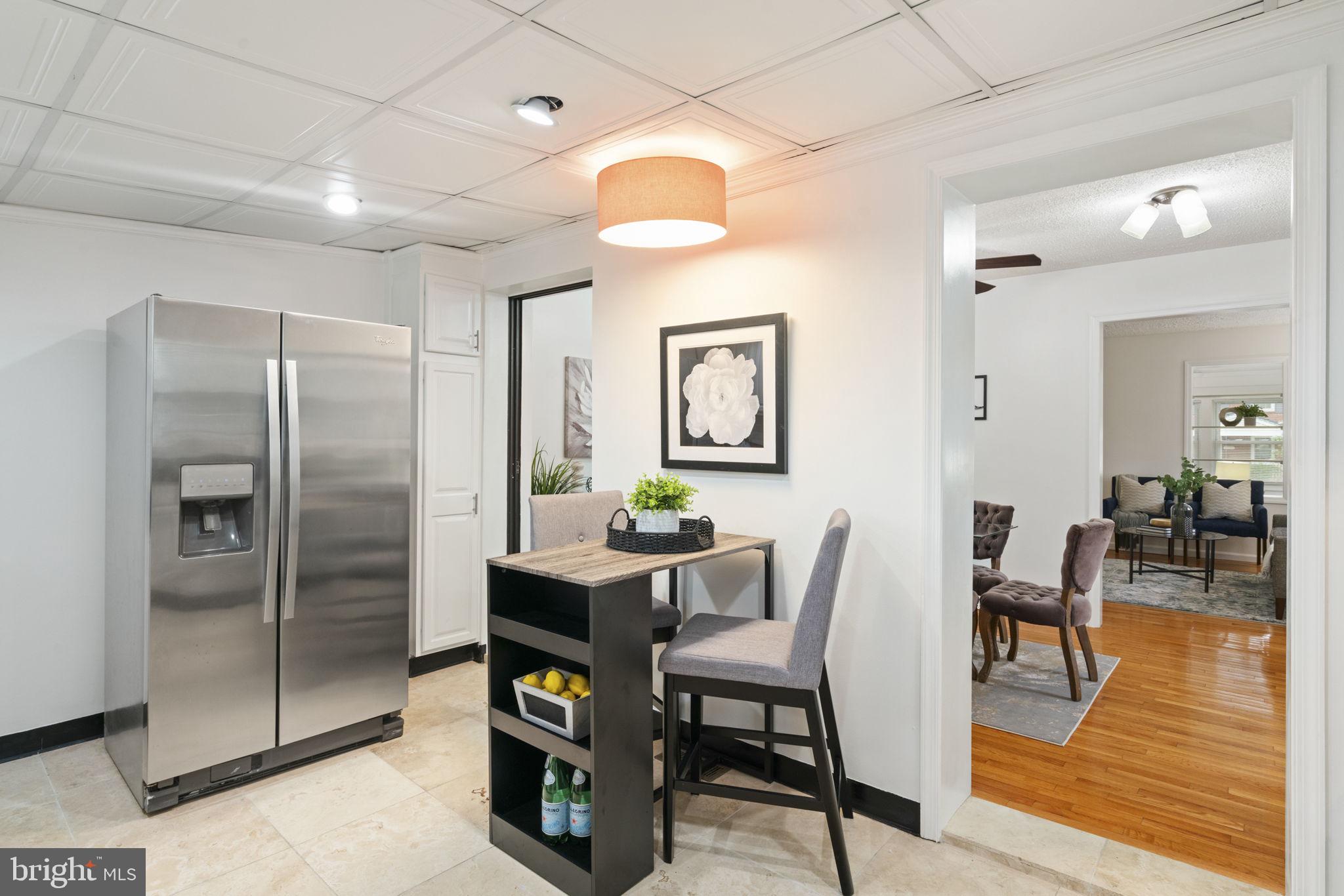2732 Fort Drive Alexandria, VA 22303 - Photo 18 of 47 a view of a dining room with furniture window and wooden floor