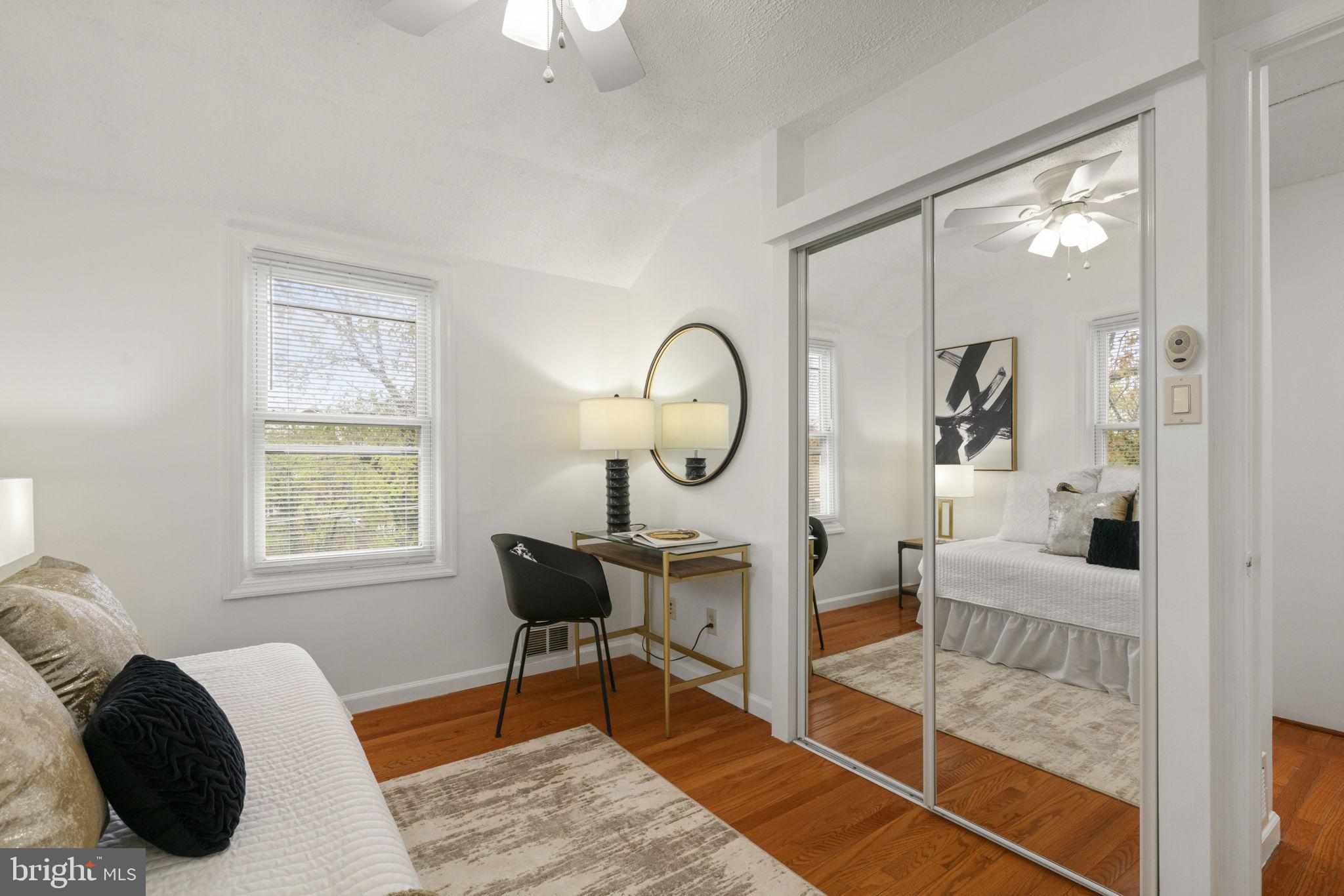 2732 Fort Drive Alexandria, VA 22303 - Photo 22 of 47 a living room with furniture a window and a chandelier