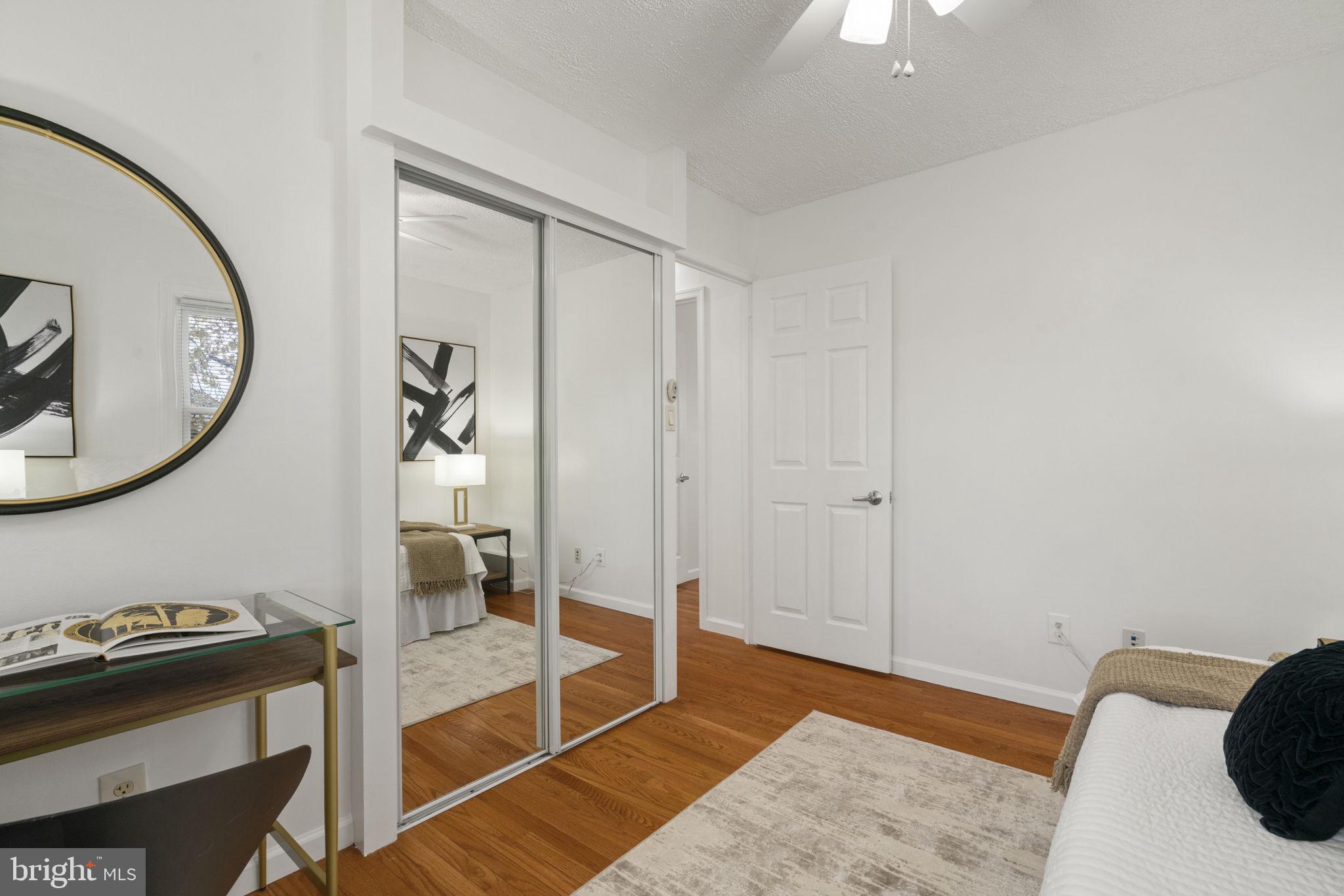2732 Fort Drive Alexandria, VA 22303 - Photo 23 of 47 a bedroom with a bed and a mirror on the wall