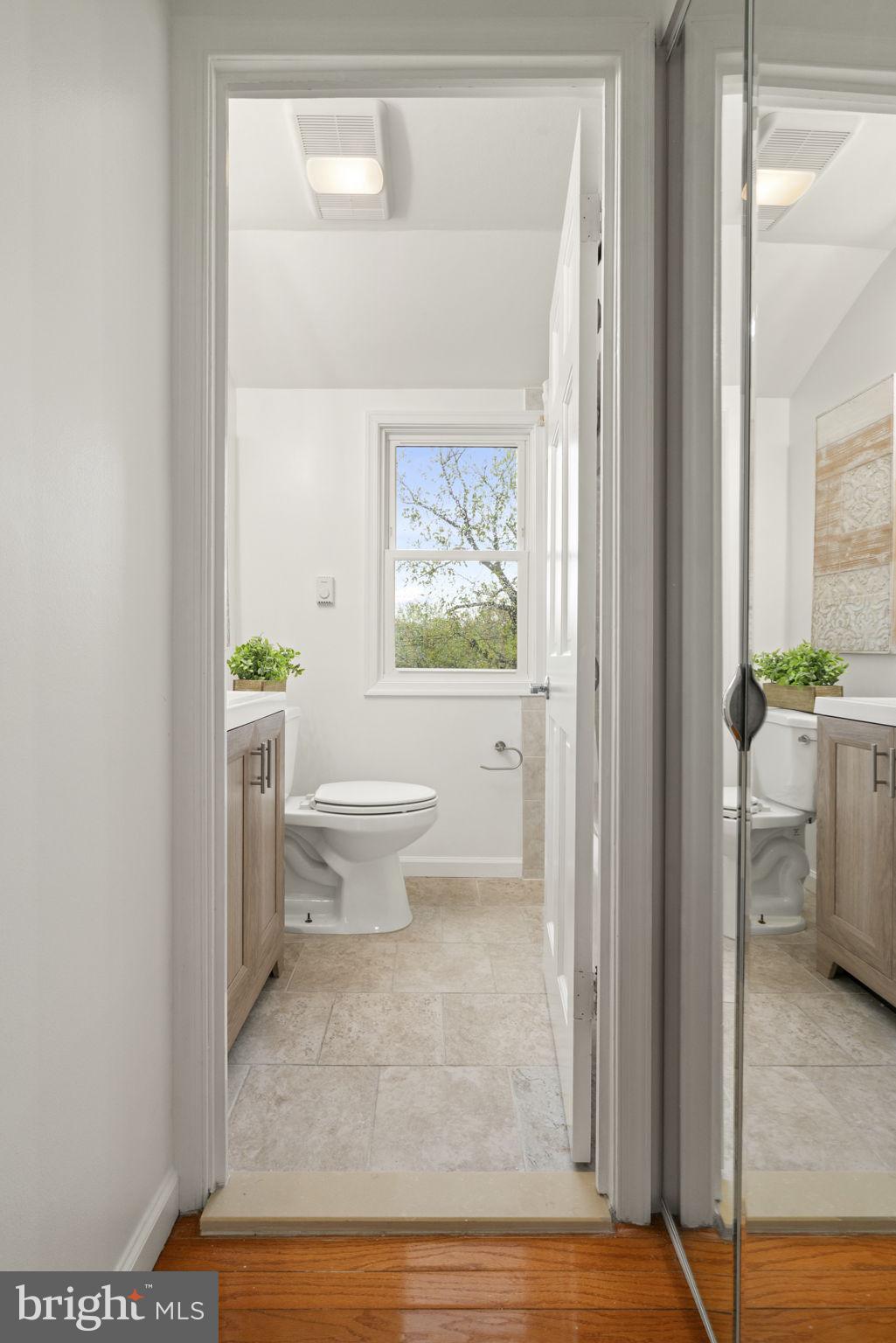 2732 Fort Drive Alexandria, VA 22303 - Photo 24 of 47 a view of bathroom with a toilet and a window