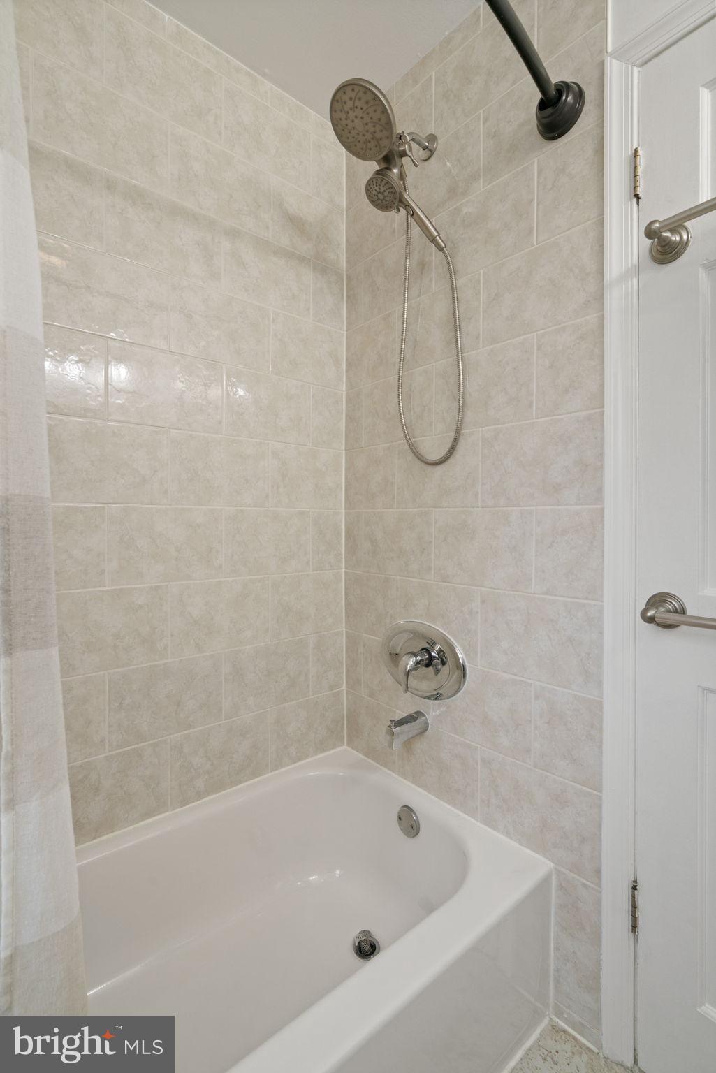 2732 Fort Drive Alexandria, VA 22303 - Photo 26 of 47 a bathroom with a bath tub with a shower