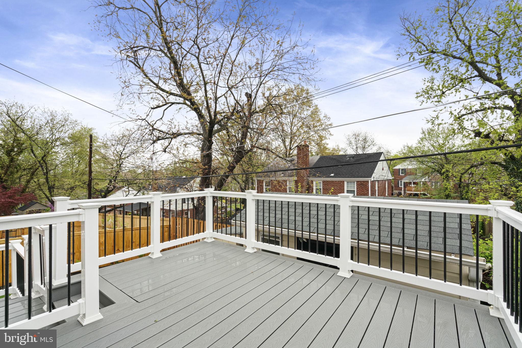 2732 Fort Drive Alexandria, VA 22303 - Photo 36 of 47 a view of a deck with wooden floor and fence