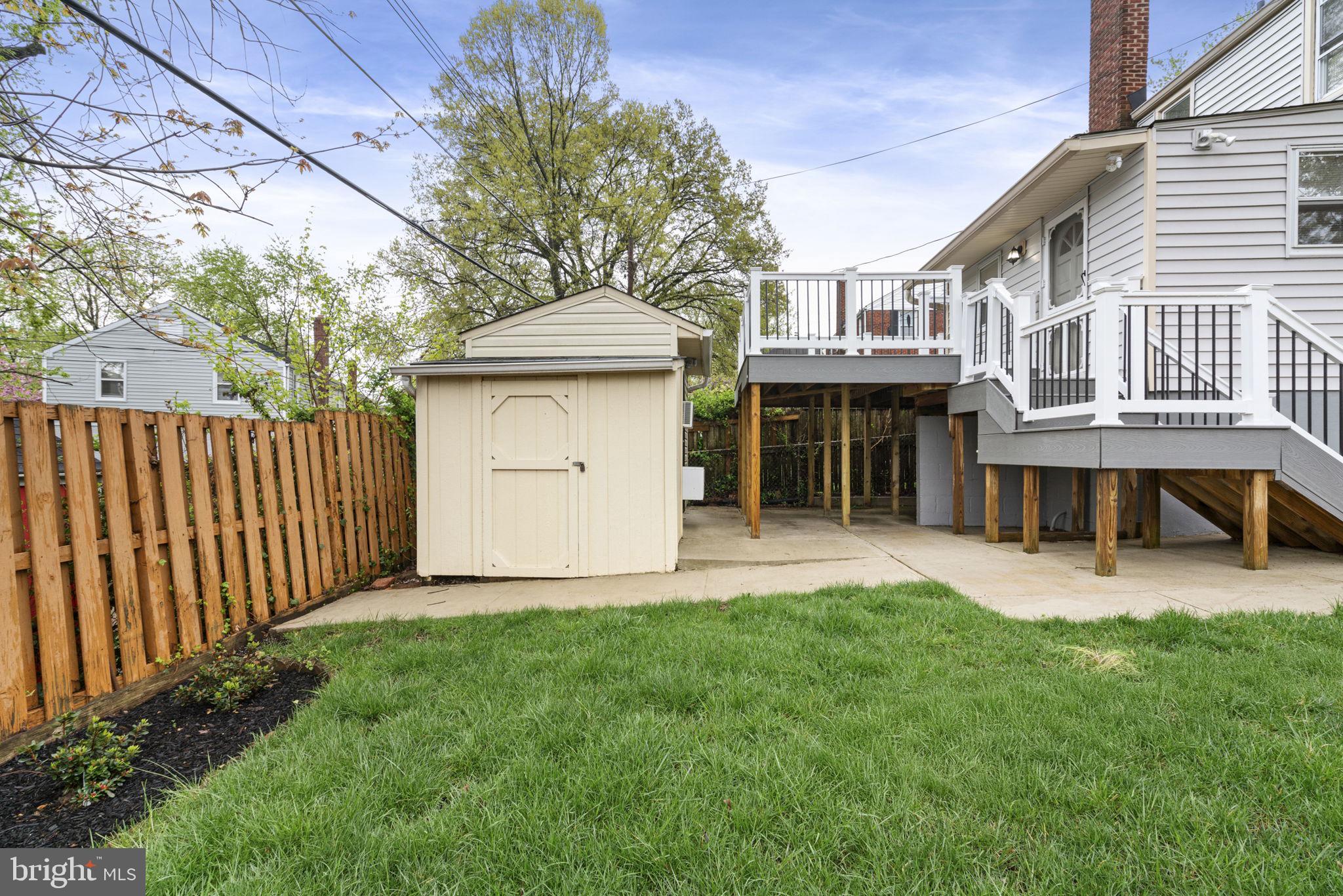 2732 Fort Drive Alexandria, VA 22303 - Photo 40 of 47 a view of a house with a yard and sitting area