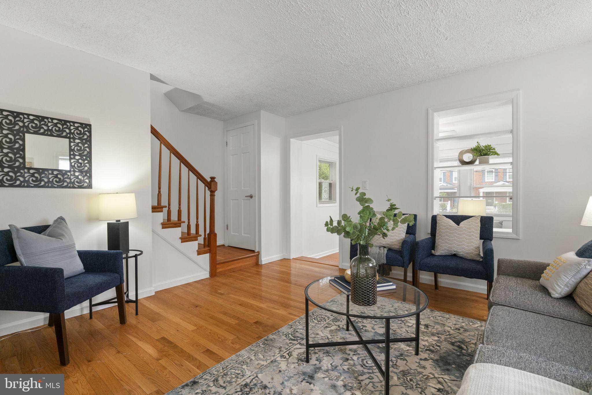 2732 Fort Drive Alexandria, VA 22303 - Photo 9 of 47 a living room with furniture potted plant and wooden floor