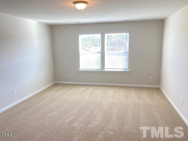 132 Montasel Court Fuquay-Varina, NC 27526 - Photo 15 of 20 an empty room with a window