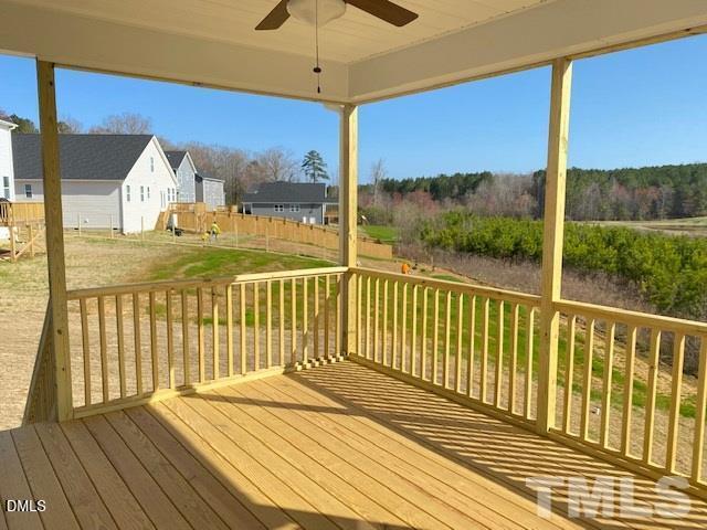 132 Montasel Court Fuquay-Varina, NC 27526 - Photo 19 of 20 a view of a balcony with wooden floor