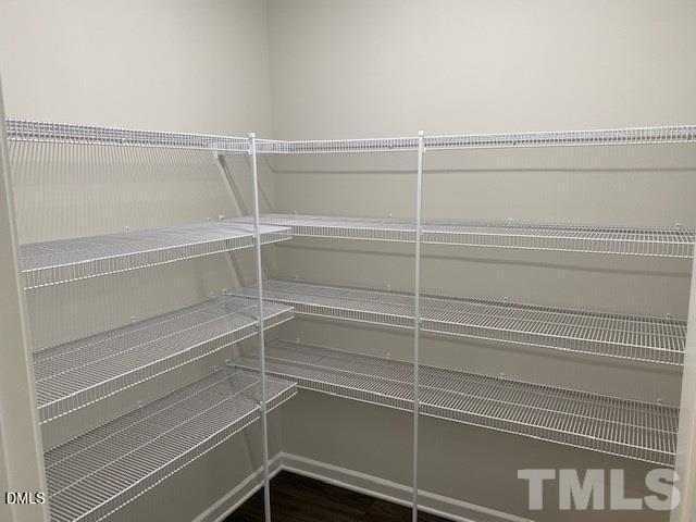 132 Montasel Court Fuquay-Varina, NC 27526 - Photo 7 of 20 a view of a room with rack on the wall