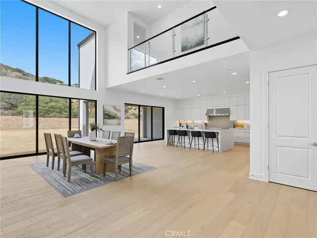 a view of a livingroom with furniture and a dinning table
