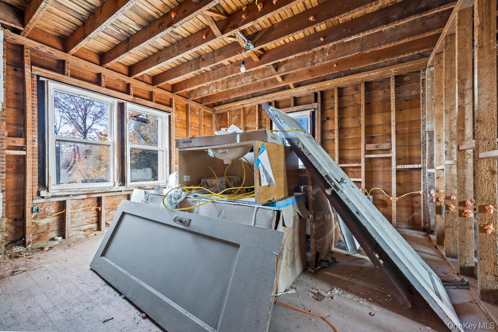 162 Old Mamaroneck Road White Plains, NY 10605 - Photo 14 of 22 a view of living room with furniture and large windows
