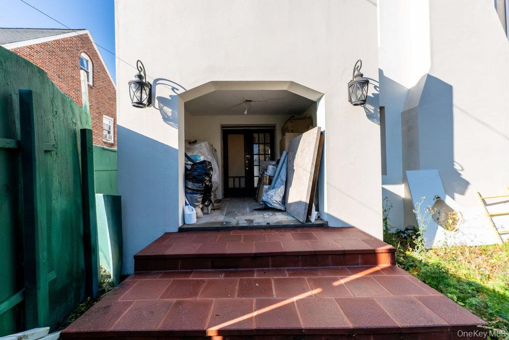 162 Old Mamaroneck Road White Plains, NY 10605 - Photo 16 of 22 a front view of a house with a yard