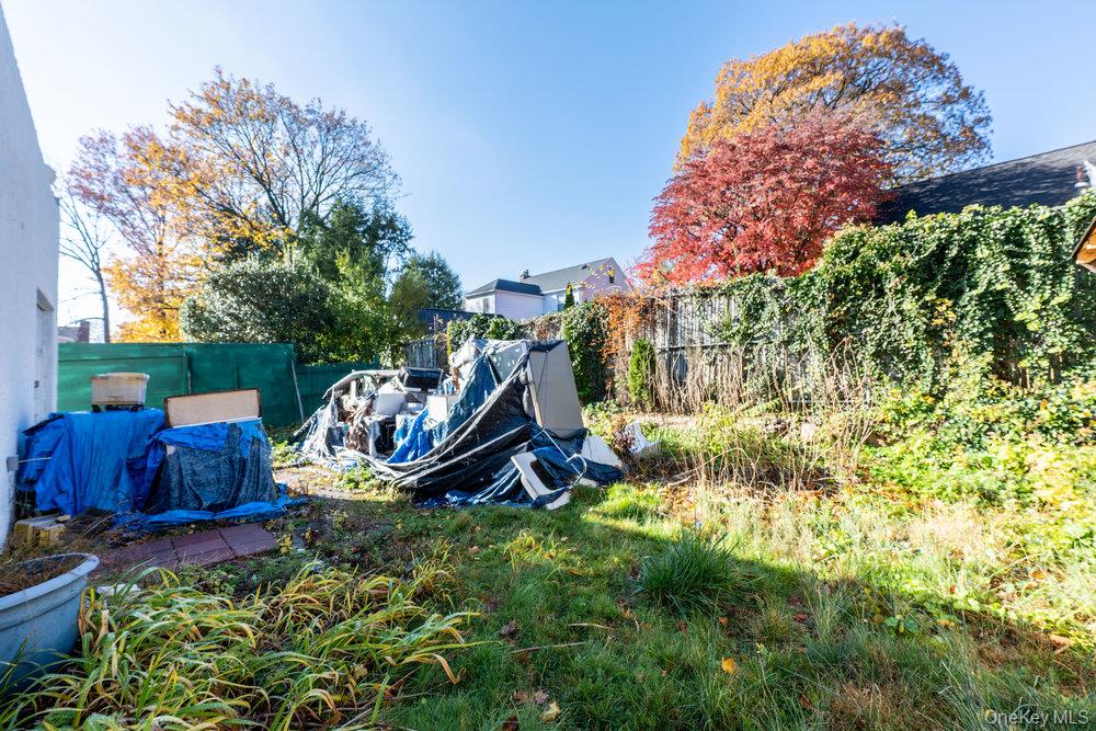 162 Old Mamaroneck Road White Plains, NY 10605 - Photo 19 of 22 a view of a backyard with plants and garden