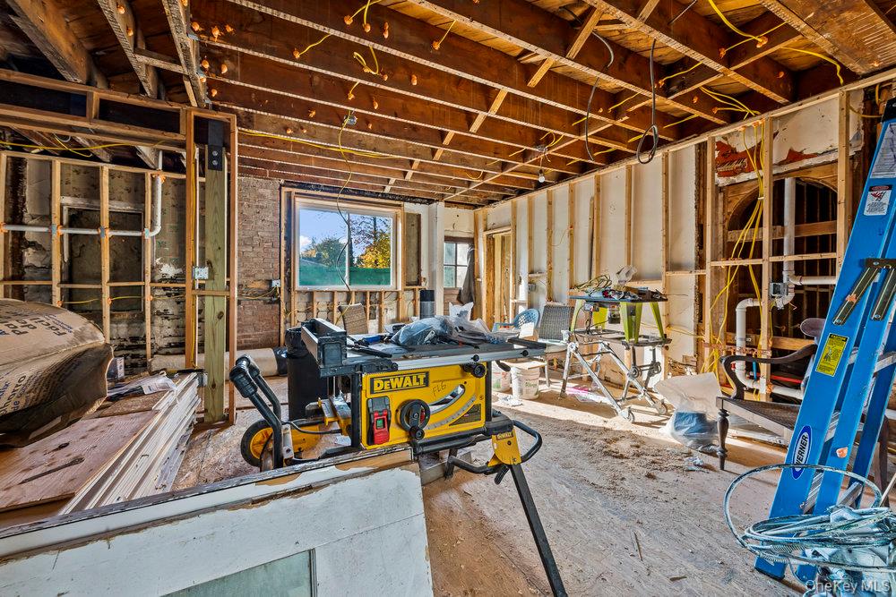 162 Old Mamaroneck Road White Plains, NY 10605 - Photo 6 of 22 a view of a room with gym equipment