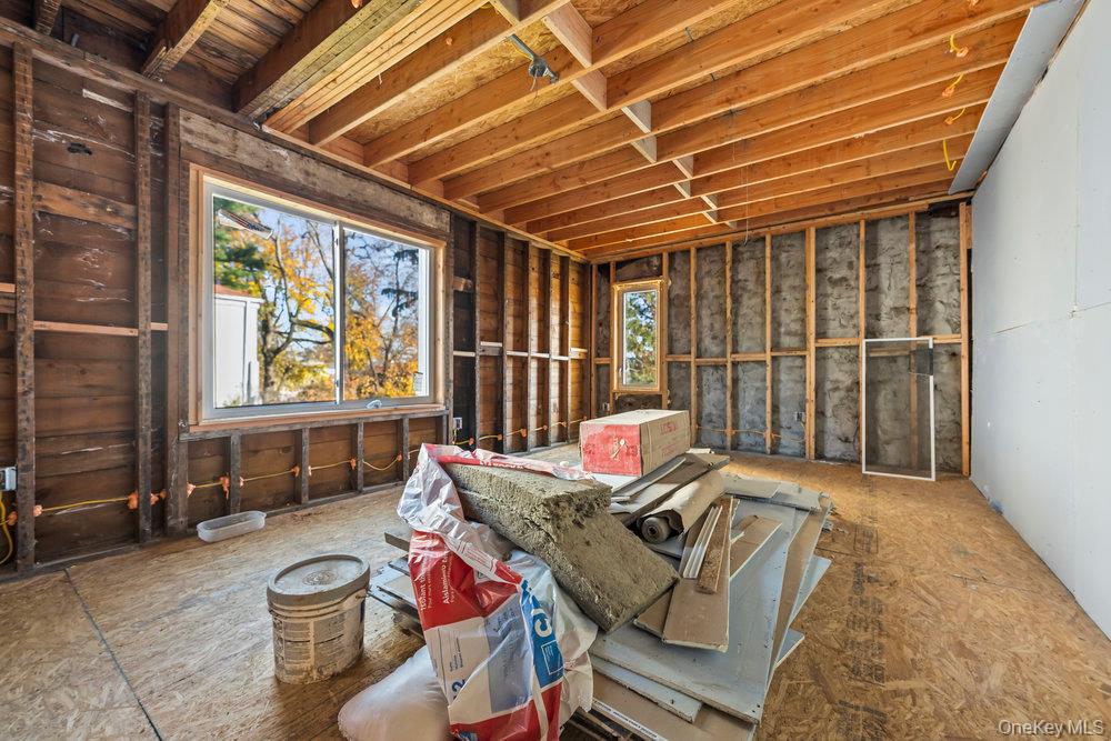 162 Old Mamaroneck Road White Plains, NY 10605 - Photo 9 of 22 a view of a patio with table and chairs with wooden floor
