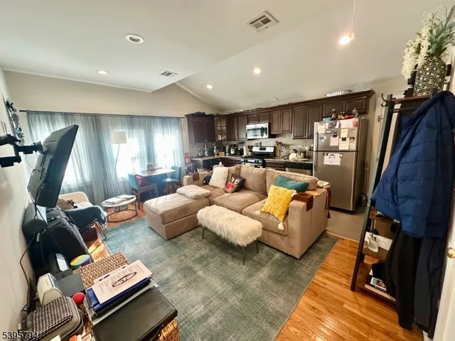 a living room with furniture and a couch