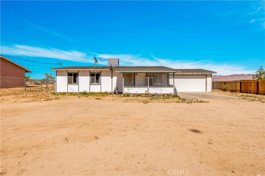 4805 Avenida La Mirada Joshua Tree, CA 92252 - Photo 2 of 38 a house view with a outdoor space