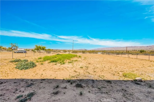 an aerial view of residential house and green space
