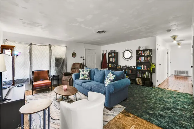 a bed room with a bed and furniture