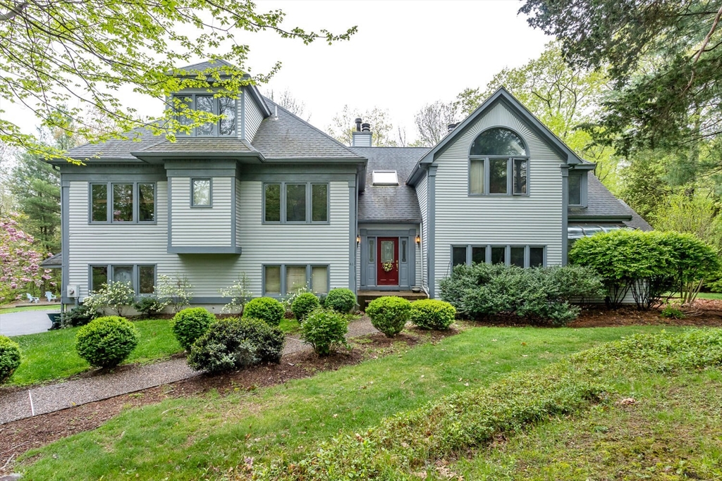 45 Strawberry Lane Canton, MA 02021 - Photo 1 of 32 a front view of a house with a yard