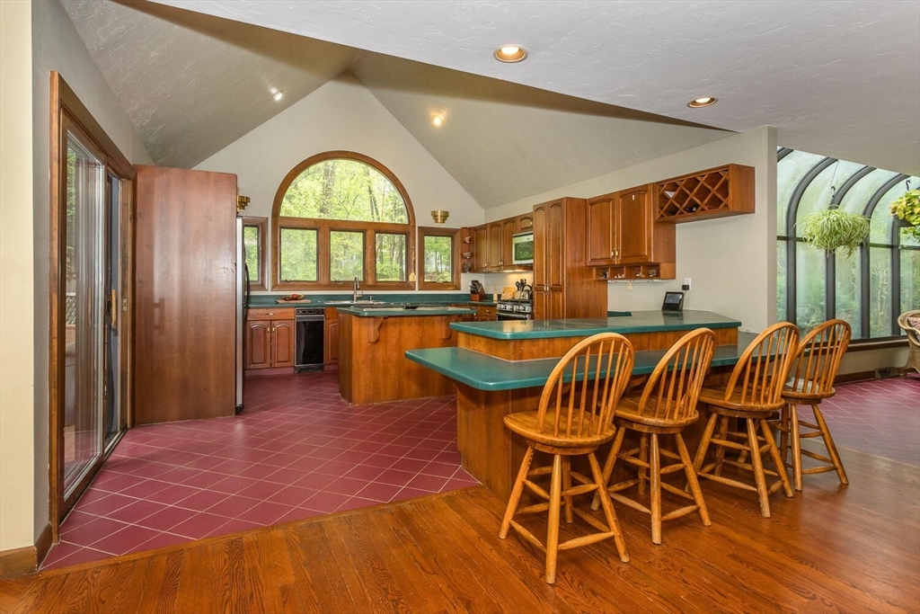 45 Strawberry Lane Canton, MA 02021 - Photo 11 of 32 a view of a dining room with furniture window and wooden floor