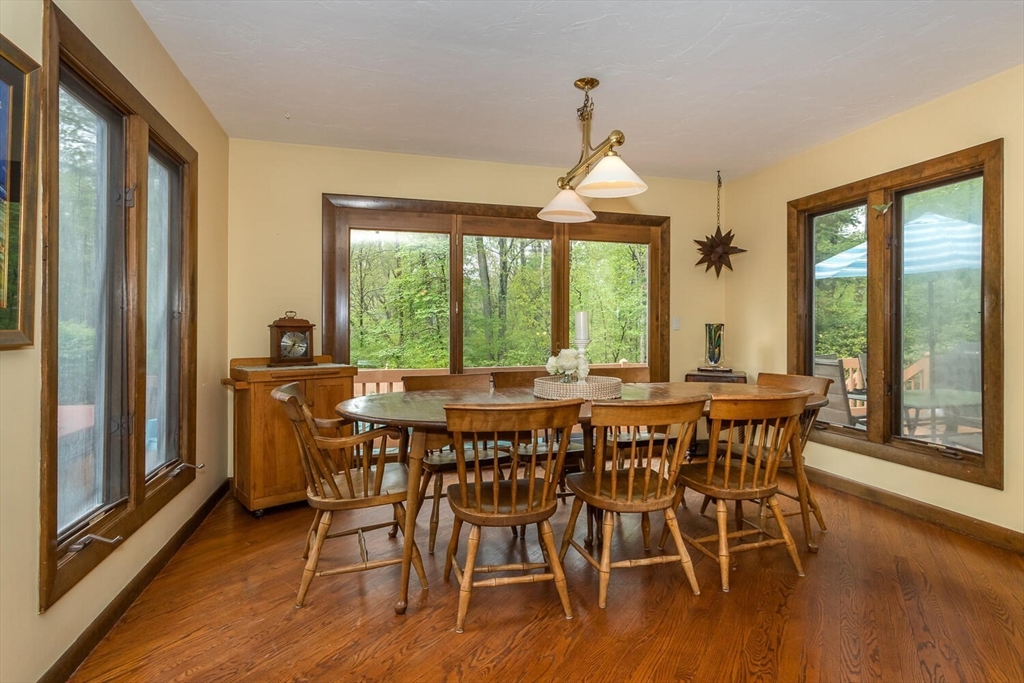 45 Strawberry Lane Canton, MA 02021 - Photo 15 of 32 a view of a dining room with furniture window and wooden floor